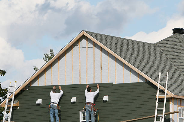 Professional Emergency Siding Repair technician working in Adrian, PA